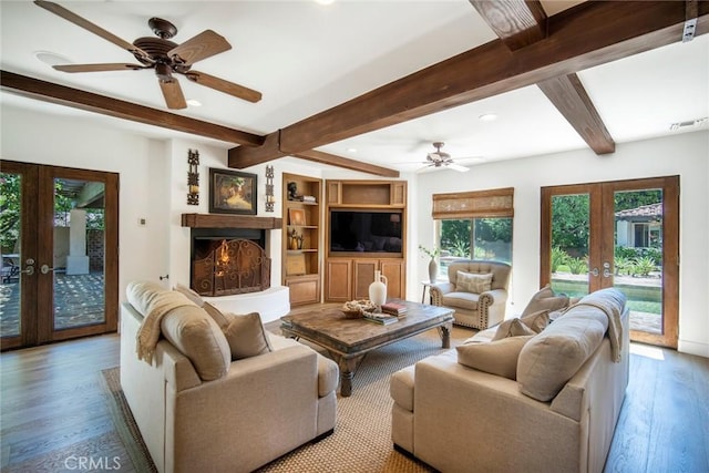 31872 Paseo Cielo, San Juan Capistrano, CA 92675 - living room featuring french doors, wood finished floors, ceiling fan, beamed ceiling, and recessed lighting