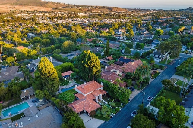 birds eye view of property with a residential view