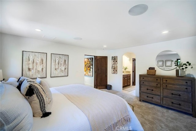 31872 Paseo Cielo, San Juan Capistrano, CA 92675 - bedroom with arched walkways, light colored carpet, recessed lighting, and ensuite bath