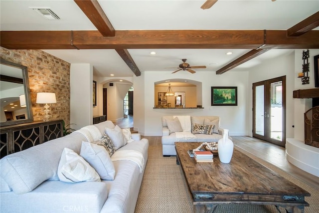 31872 Paseo Cielo, San Juan Capistrano, CA 92675 - living area featuring a ceiling fan, arched walkways, beam ceiling, light wood-style floors, and recessed lighting