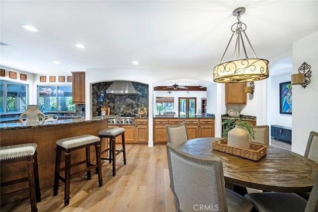 dining room with a ceiling fan, visible vents, recessed lighting, and light wood-type flooring
