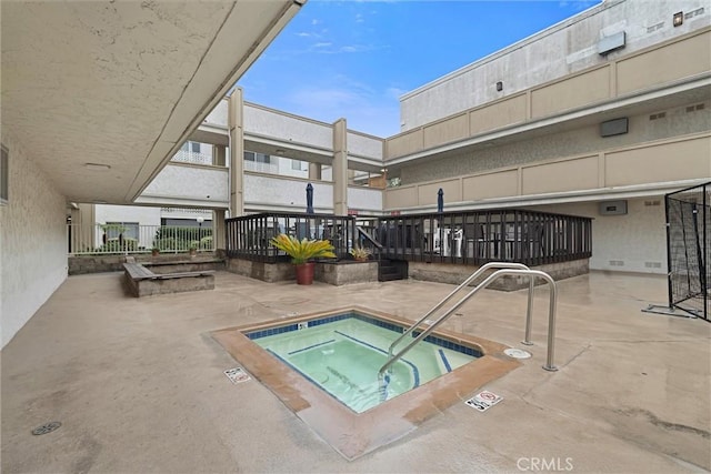 3565 Linden Ave Unit 220, Long Beach, CA 90807 - view of pool with a community hot tub, a swimming pool, and a patio area