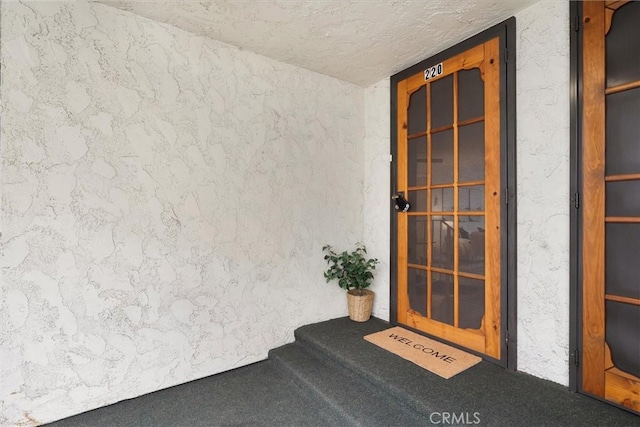 3565 Linden Ave Unit 220, Long Beach, CA 90807 - doorway to property featuring stucco siding and covered porch