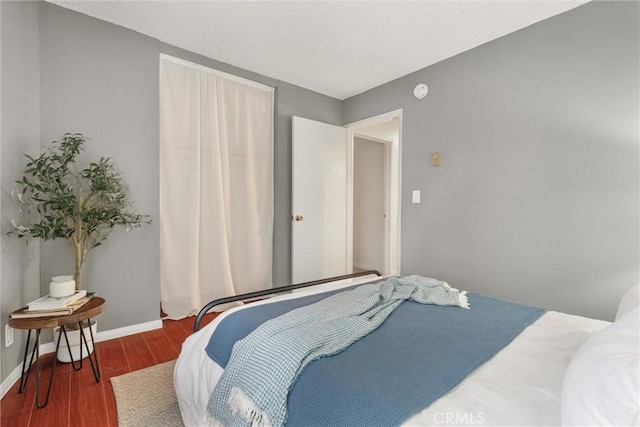 3565 Linden Ave Unit 220, Long Beach, CA 90807 - bedroom with wood finished floors and baseboards