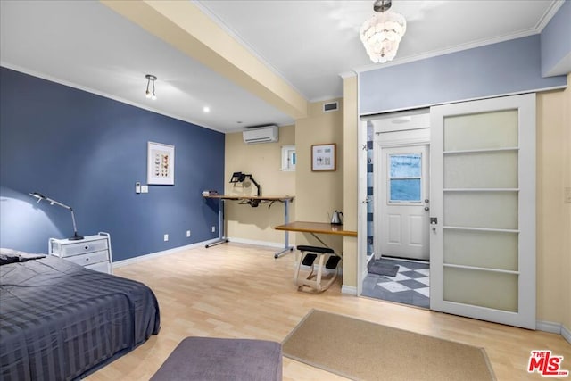 bedroom featuring ornamental molding, hardwood / wood-style floors, and an AC wall unit