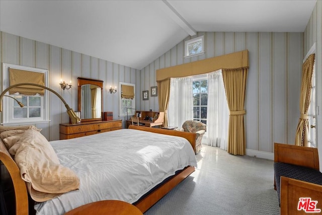 bedroom with lofted ceiling with beams, carpet, and access to outside