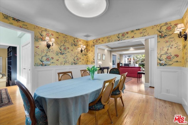 dining room featuring light hardwood / wood-style flooring