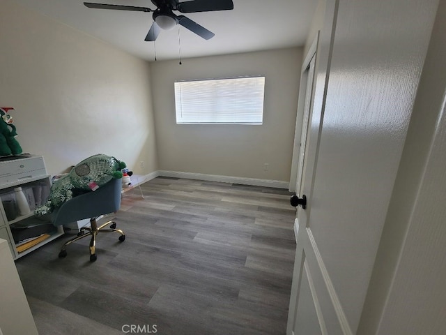 office with ceiling fan and light wood-type flooring