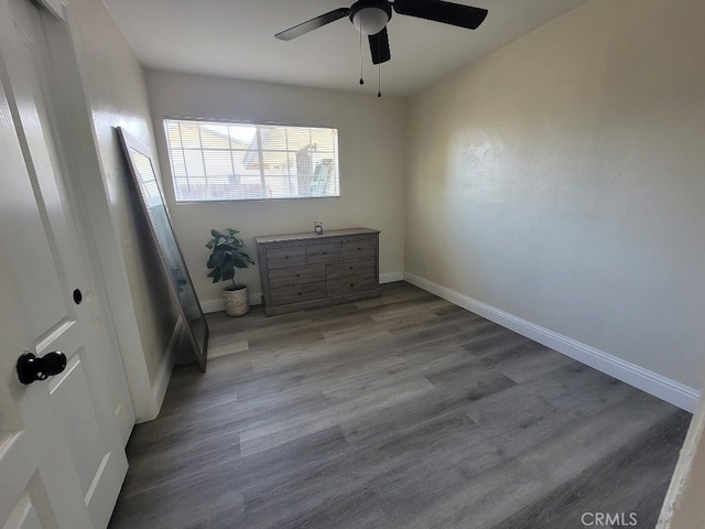 unfurnished bedroom with ceiling fan and light hardwood / wood-style floors