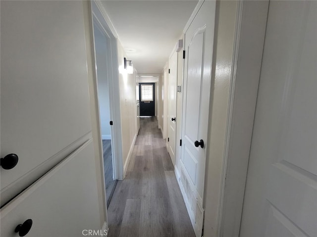 hall featuring wood-type flooring