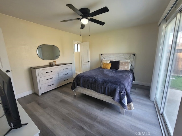 bedroom featuring hardwood / wood-style floors and ceiling fan