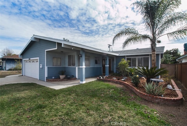 single story home with a garage and a front lawn