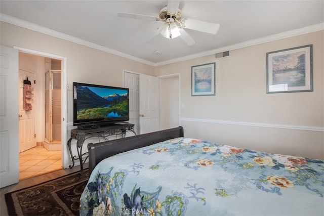 tiled bedroom with crown molding, ensuite bath, and ceiling fan