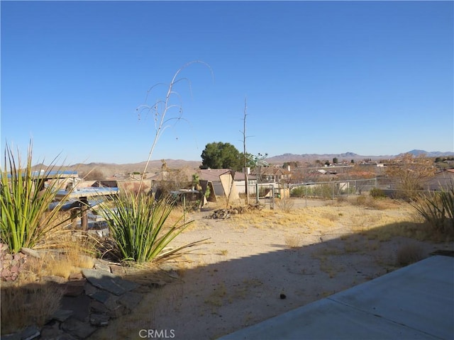 view of yard with a mountain view