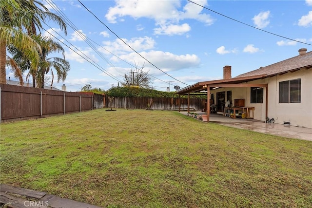 view of yard with a patio area