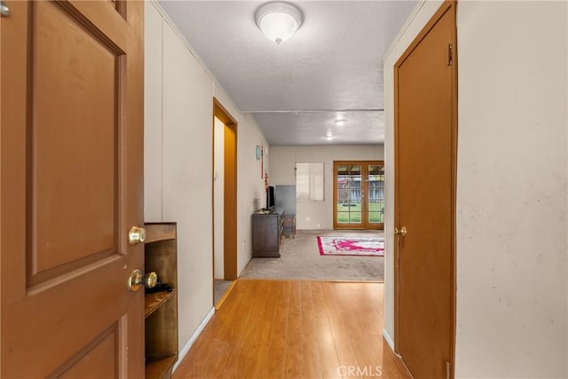 hallway featuring light wood-type flooring