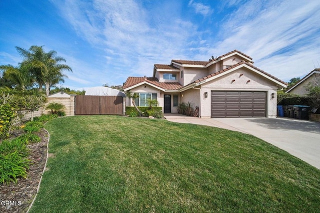 mediterranean / spanish house featuring a garage and a front lawn