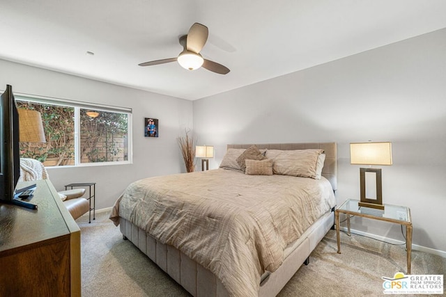 carpeted bedroom featuring ceiling fan