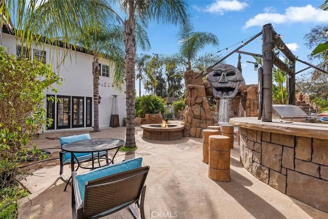 view of patio / terrace featuring exterior kitchen