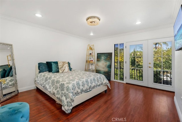 bedroom featuring crown molding, dark hardwood / wood-style floors, and access to outside