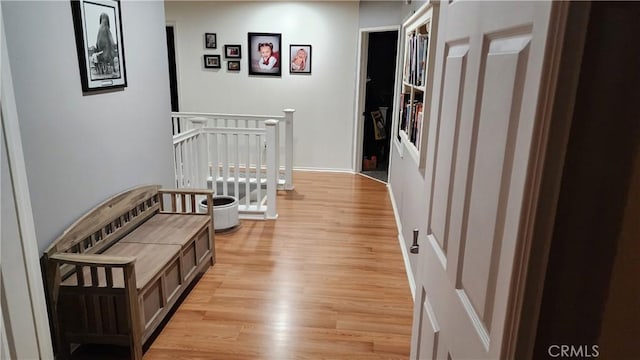 hallway featuring light hardwood / wood-style flooring