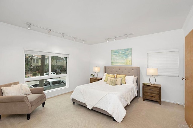 carpeted bedroom with crown molding