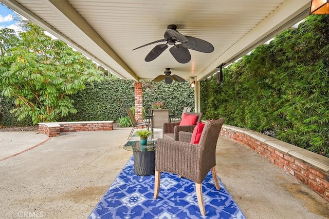 view of patio / terrace featuring ceiling fan