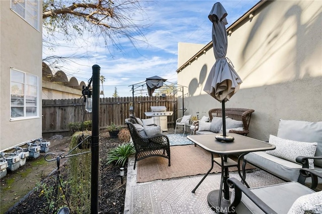 view of patio featuring an outdoor living space and area for grilling