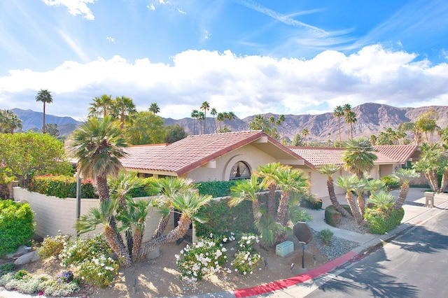 mediterranean / spanish-style house featuring a mountain view