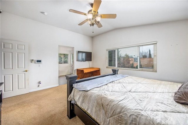 carpeted bedroom with multiple windows, lofted ceiling, and ceiling fan