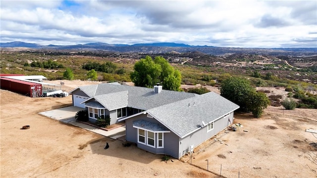 bird's eye view featuring a mountain view