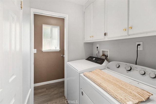 40350 Exa Ely Rd, Hemet, CA 92544 - laundry area featuring washer and clothes dryer, cabinet space, wood finished floors, and baseboards