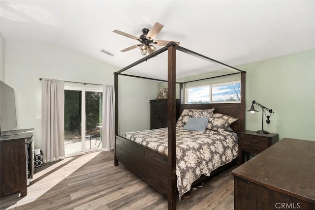 40350 Exa Ely Rd, Hemet, CA 92544 - bedroom with lofted ceiling, access to exterior, wood finished floors, and ceiling fan
