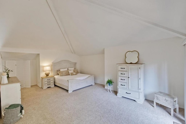 bedroom featuring vaulted ceiling with beams and light colored carpet