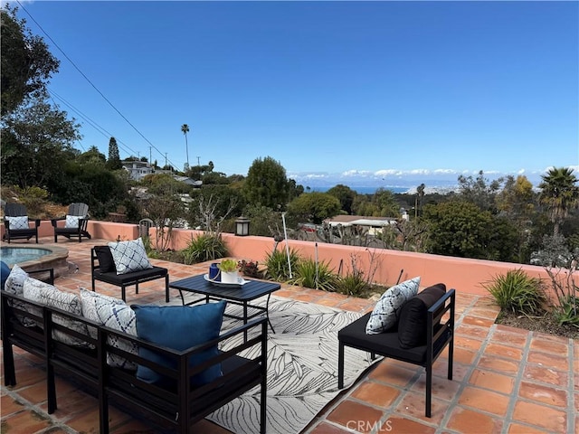 view of patio / terrace with an outdoor hangout area