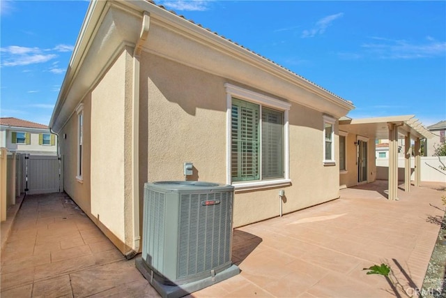 exterior space featuring a patio area and central AC unit