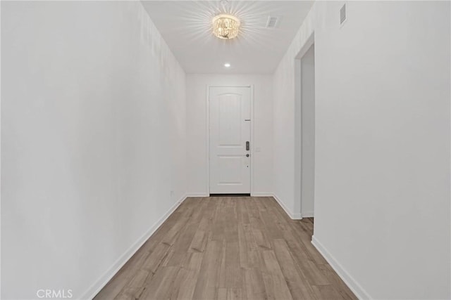 hall featuring light hardwood / wood-style floors