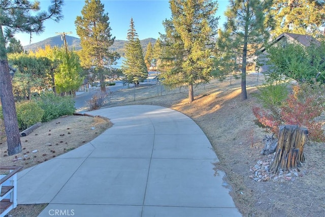 surrounding community featuring a mountain view