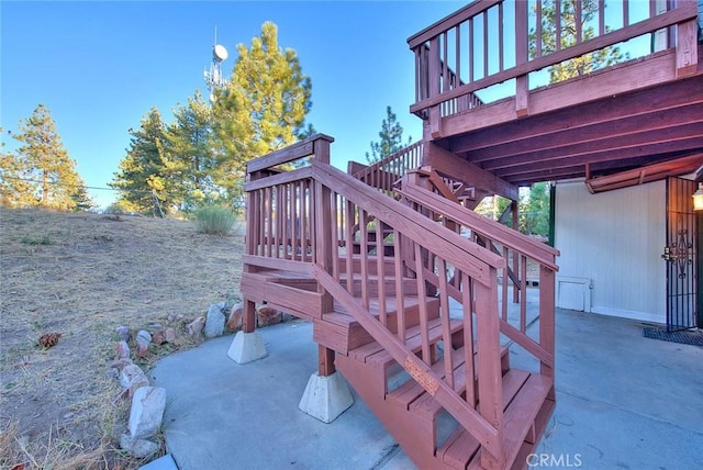 wooden deck featuring a patio area