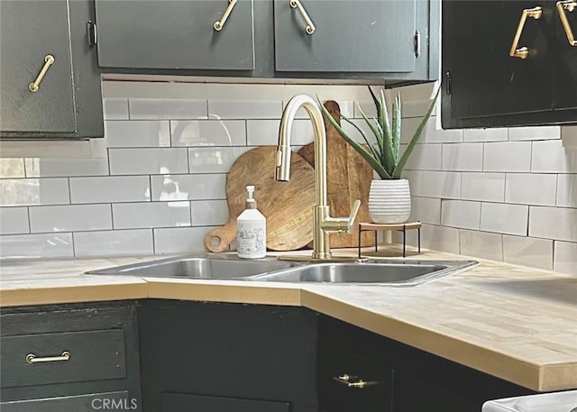 kitchen with sink and backsplash