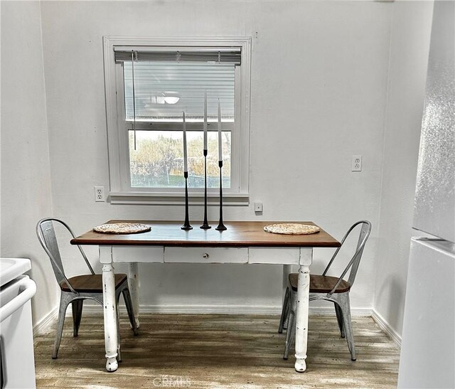 dining room featuring hardwood / wood-style flooring