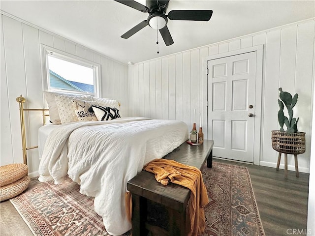 bedroom with dark wood-type flooring and ceiling fan