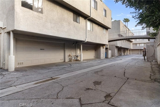 exterior space with a garage