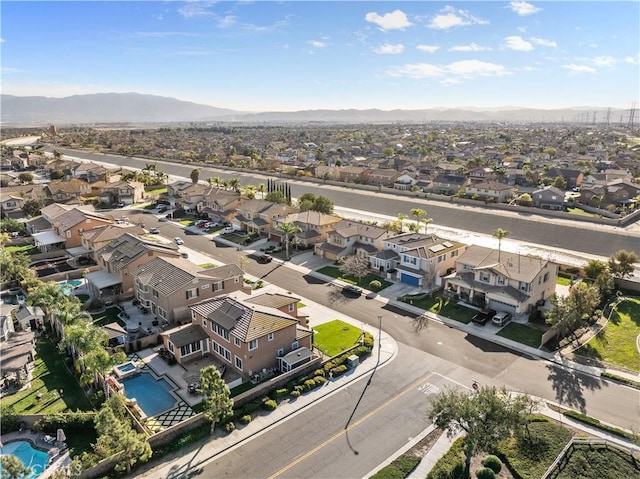 bird's eye view with a residential view and a mountain view