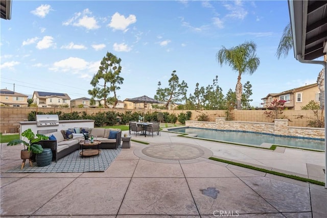 view of patio / terrace featuring a grill, a fenced in pool, an outdoor living space, and a fenced backyard