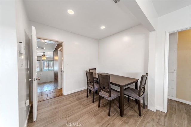 dining room with light wood-type flooring