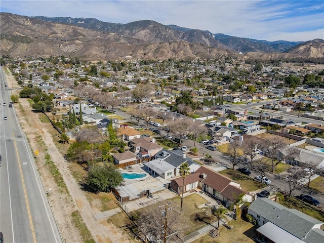 drone / aerial view featuring a mountain view