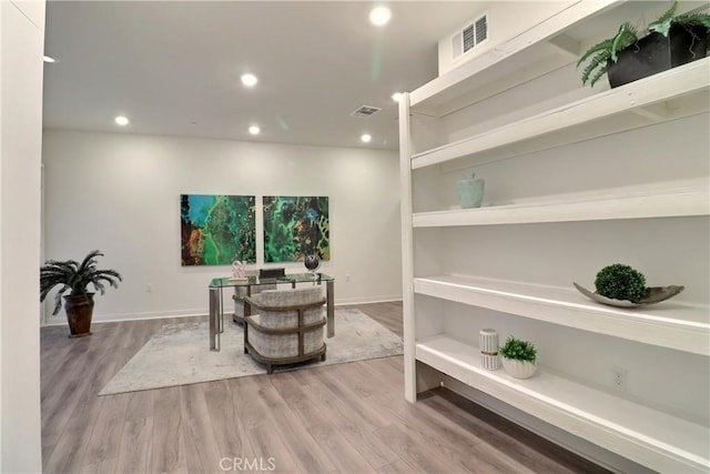 office area featuring recessed lighting, visible vents, and light wood-style floors