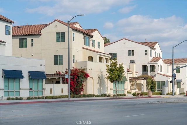 view of building exterior with a residential view