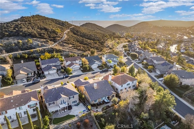 drone / aerial view featuring a mountain view